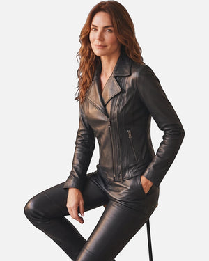 Hilda Leather Lotus women's black lambskin biker jacket with double side zippers and slim fit, worn by a model. Antalya, Turkey