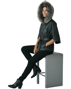 Hilda Leather black leather jacket with faux fur trimmed hood and tie waist, three-quarter sleeves.