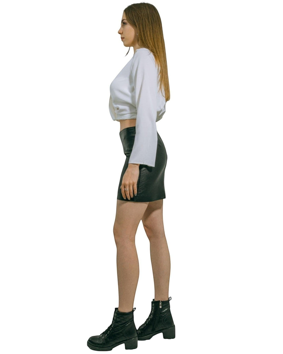 Hilda Leather black genuine lamb leather mini skirt with back zipper and lycra lining. Handmade for confident women.