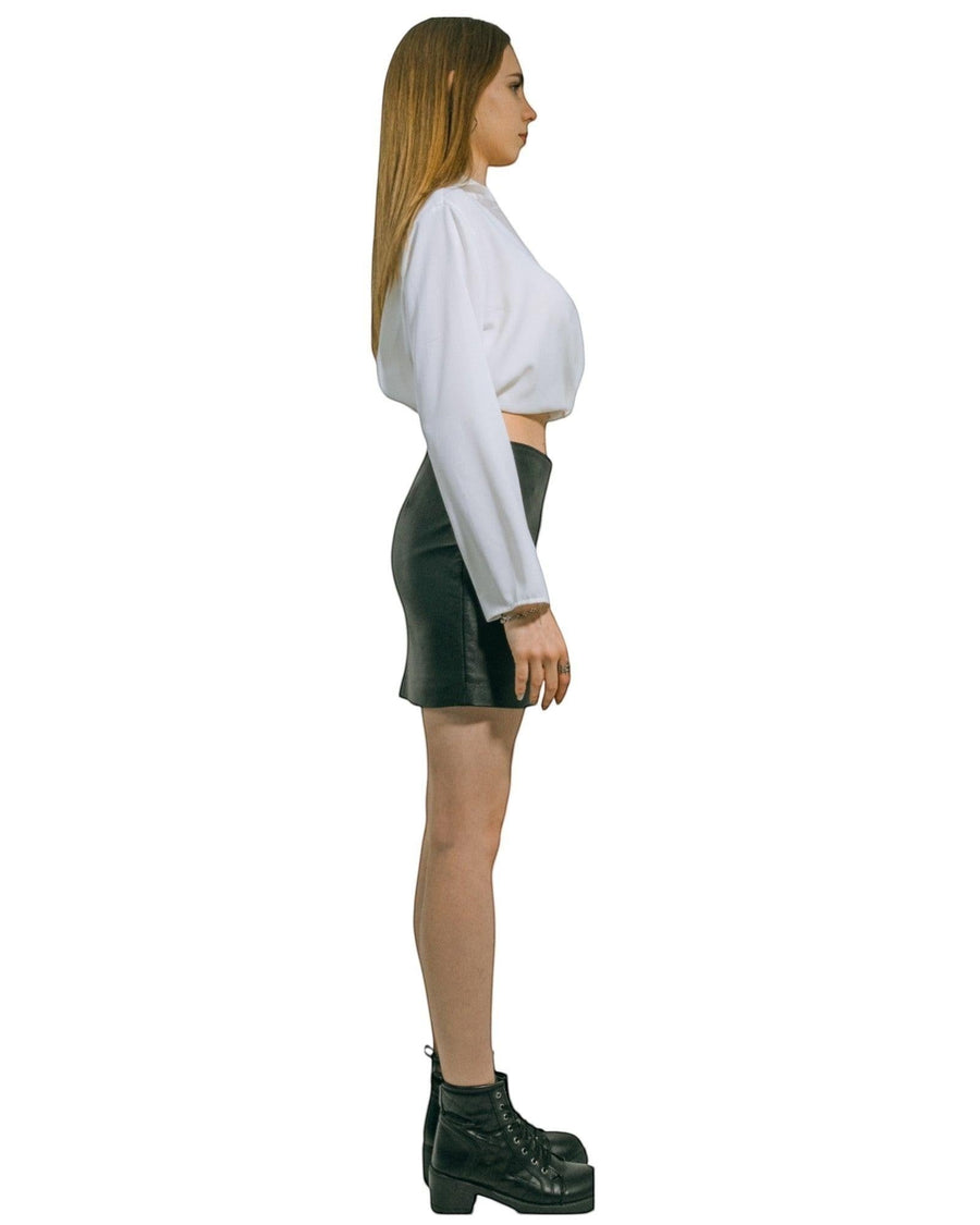 Hilda Leather black genuine lamb leather mini skirt with back zipper and lycra lining. Handmade for confident women.