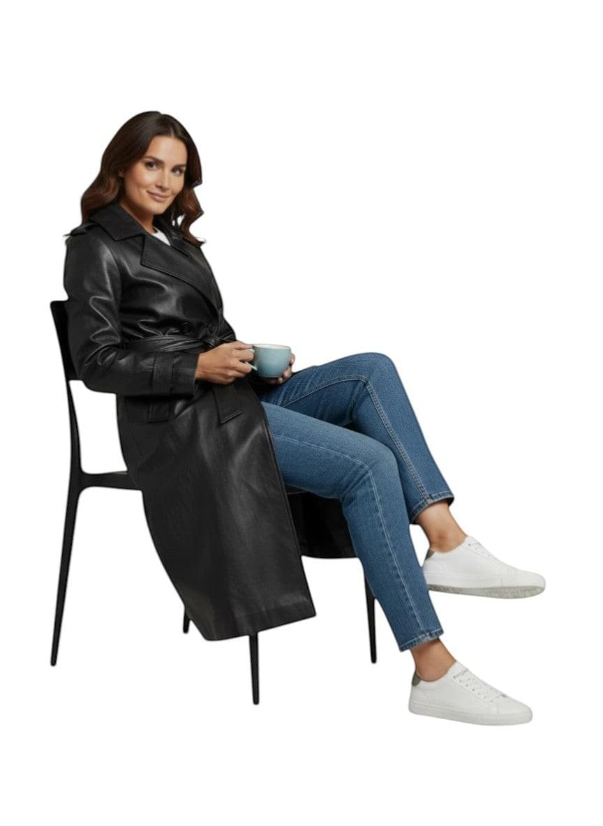 Hilda Leather Roxanne trench coat - on model sitting on chair