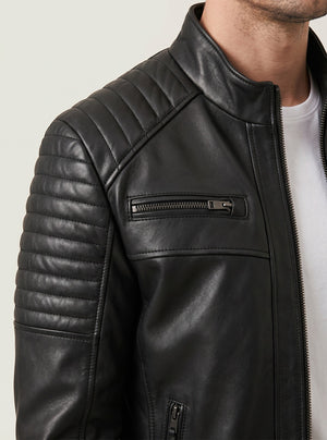 Hilda Leather Brad black lambskin jacket featuring quilted shoulder detailing, stand-up collar, and zip-front closure.