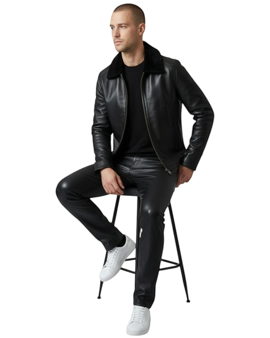 Hilda Leather black leather bomber jacket with shearling collar and zipper closure.