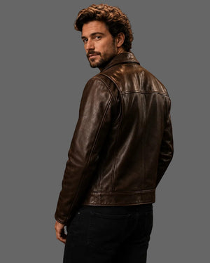 Hilda Leather dark brown cowhide biker jacket worn by a man, back view showing structured leather and stitching