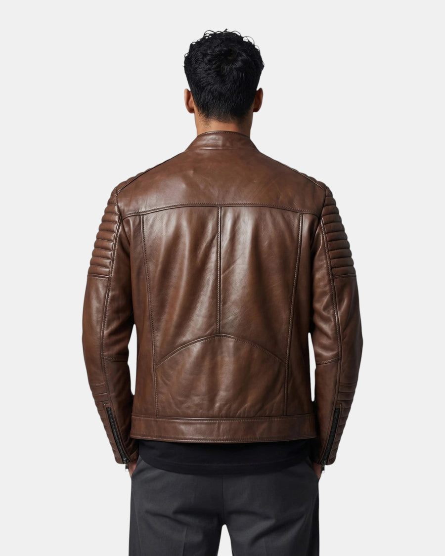 Back view of Hilda Leather brown napa lambskin jacket featuring quilted shoulder and sleeve detailing on a model.