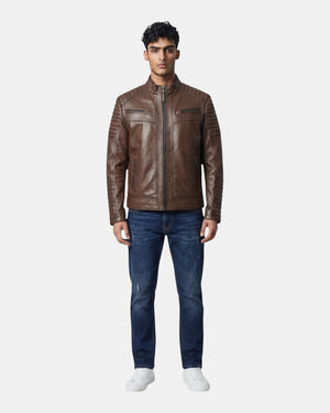 Hilda Leather brown napa lambskin jacket with quilted shoulder details worn by a model with dark jeans and sneakers