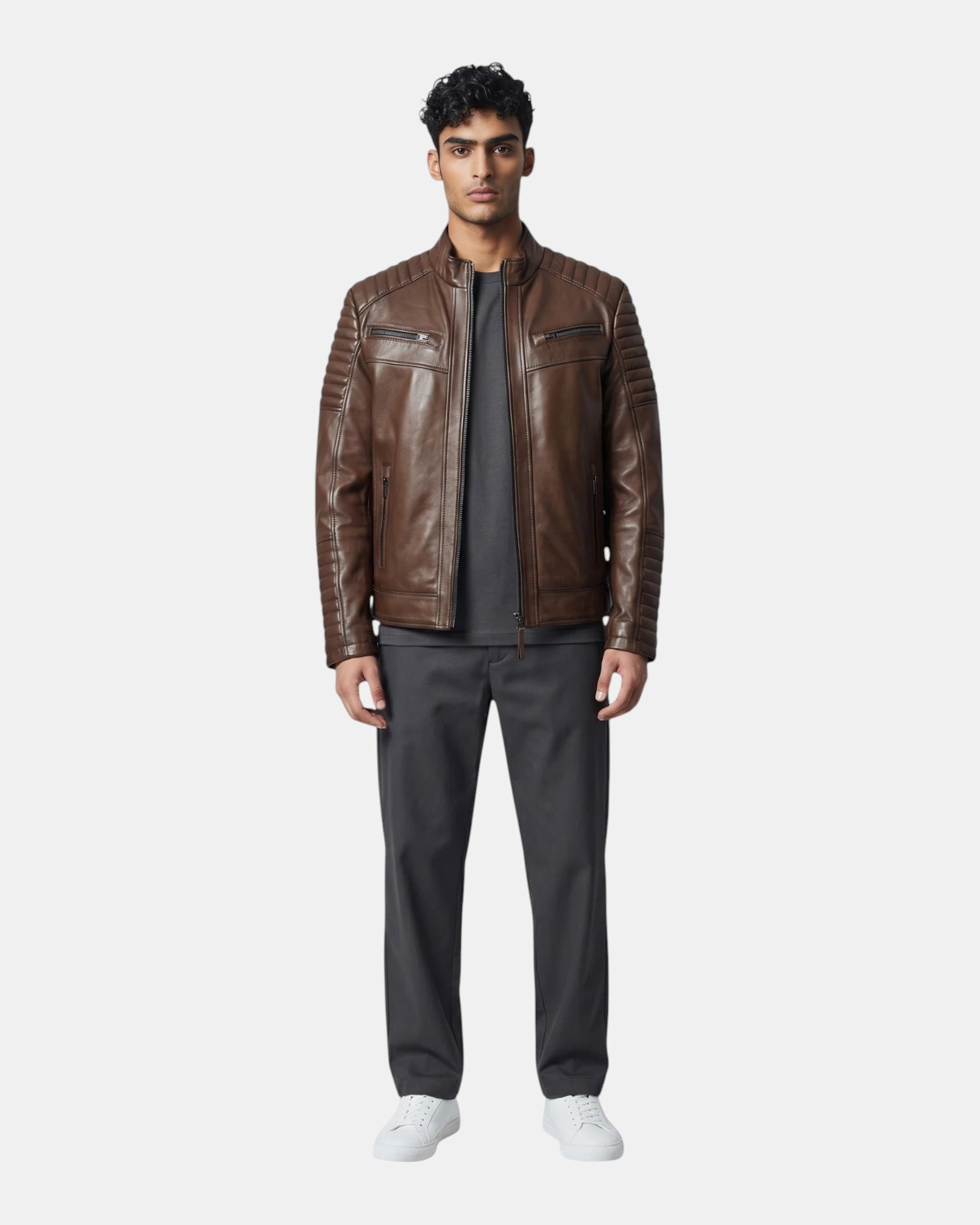Hilda Leather brown napa lambskin jacket with quilted shoulder details worn by a model in grey trousers