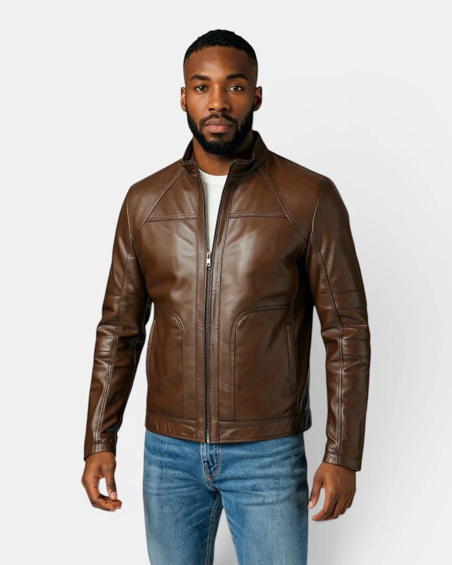 Model wearing a Hilda Leather brown genuine napa lambskin sport jacket with a stand-up collar and zip-front closure.