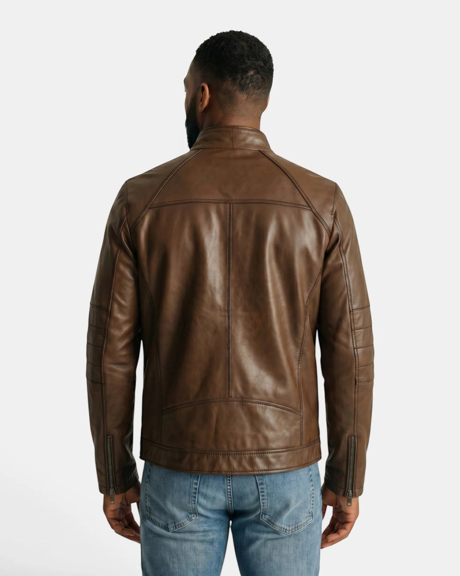 Back view of a man wearing a Hilda Leather brown napa lambskin sport jacket with a stand-up collar and zip cuffs.