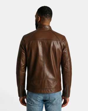 Back view of a man wearing a Hilda Leather brown napa lambskin sport jacket with a stand-up collar and zip cuffs.
