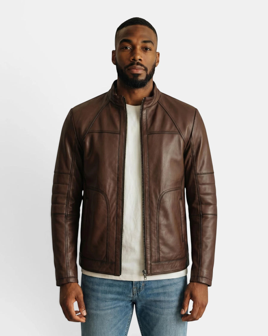 Model wearing a Hilda Leather brown napa lambskin sport jacket with a stand-up collar and zip-front closure.