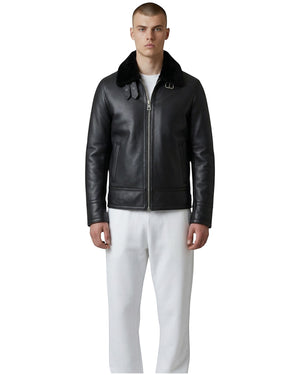 Hilda Leather black leather bomber jacket with shearling collar, zipper closure, and buckle details. Classic style for men.