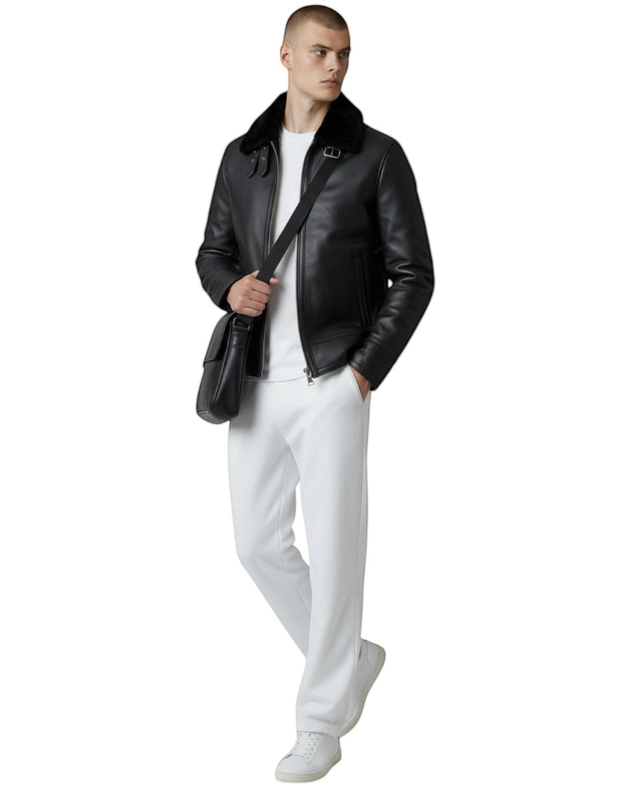 Hilda Leather black leather bomber jacket with shearling collar, zipper closure, and buckle details. Men's outerwear.